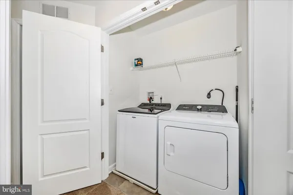 a front view of residential houses with yard