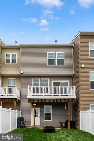 a view of a balcony with wooden floor
