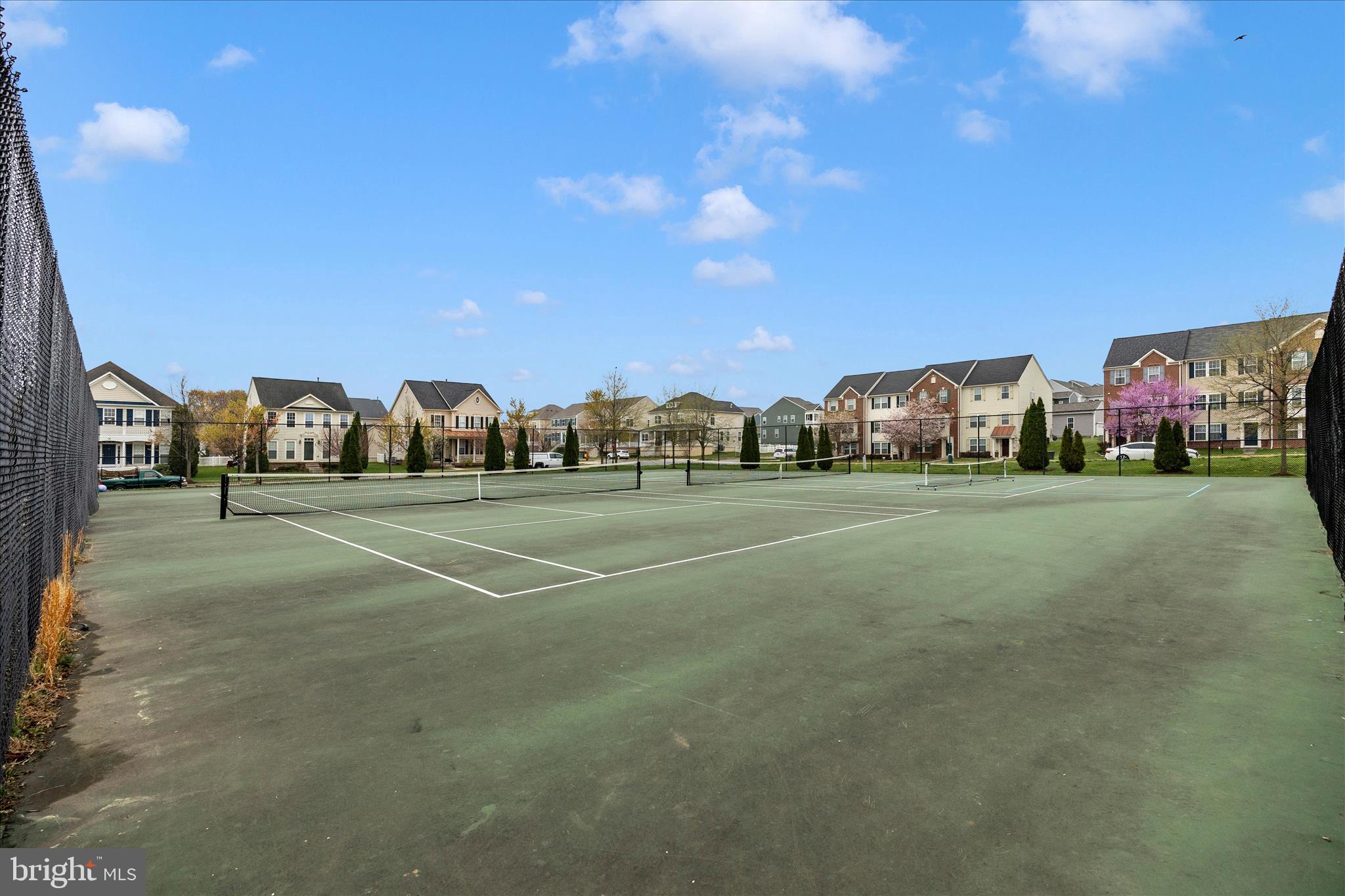 205 Union Ridge Drive Charles Town, WV 25414 - Photo 56 of 56 a view of a tennis ground with large trees