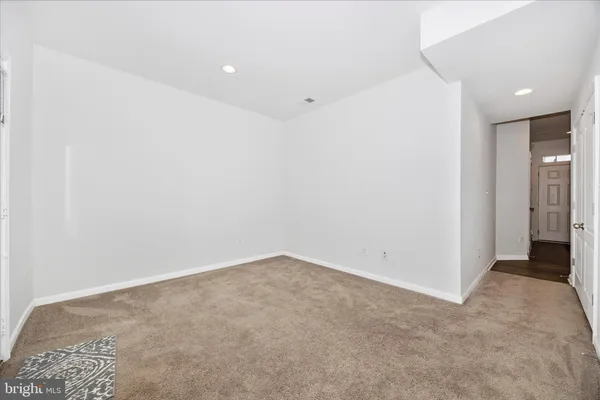 an empty room with an entryway