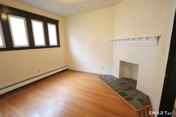 a view of an empty room and window