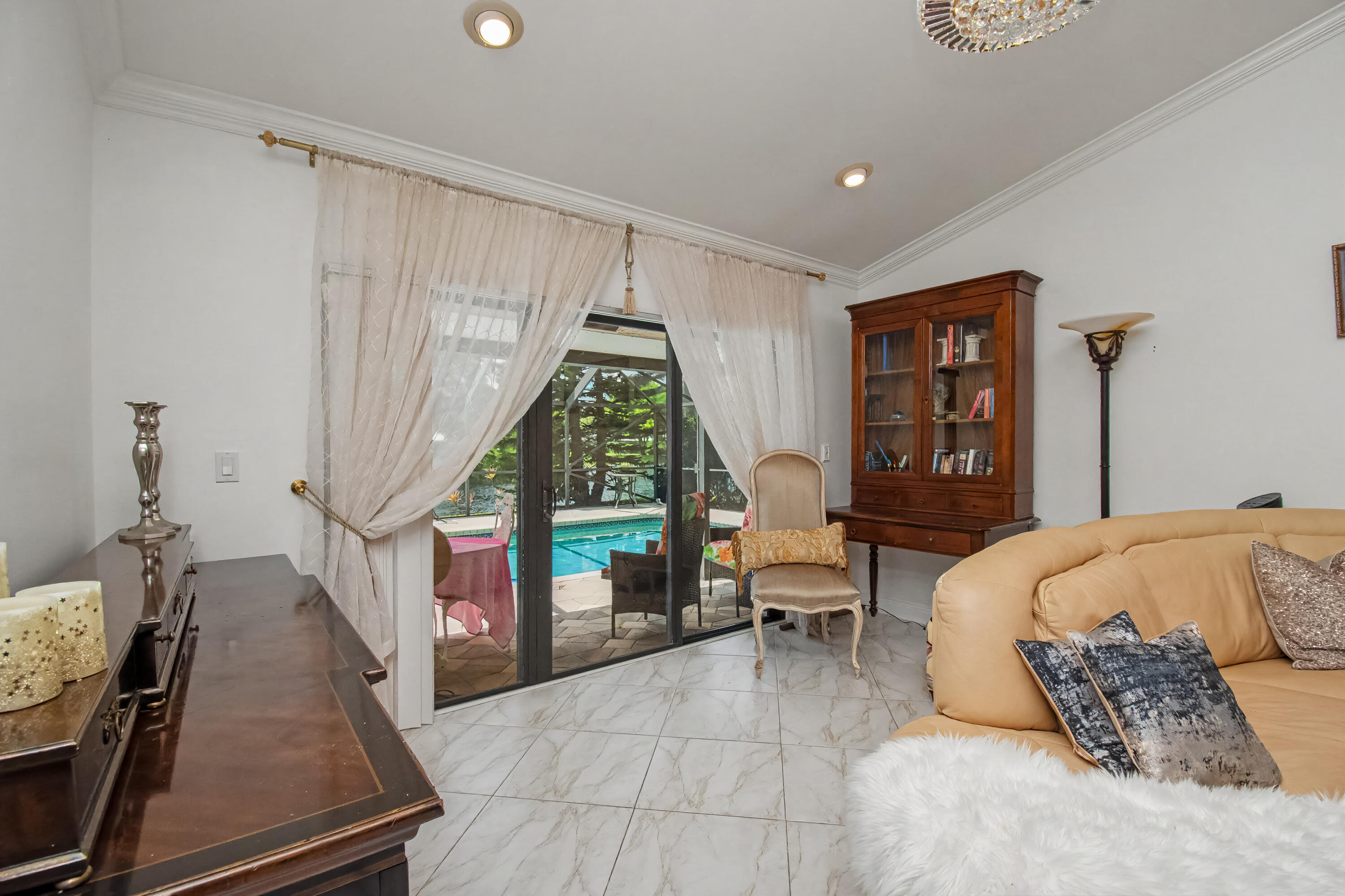 9708 Erica Court Boca Raton, FL 33496 - Photo 15 of 54 a bedroom with a bed and a window