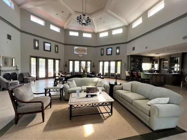 a room with gym equipment and a large mirror on the counter