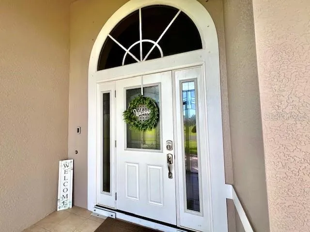 a view of a livingroom with furniture and garden