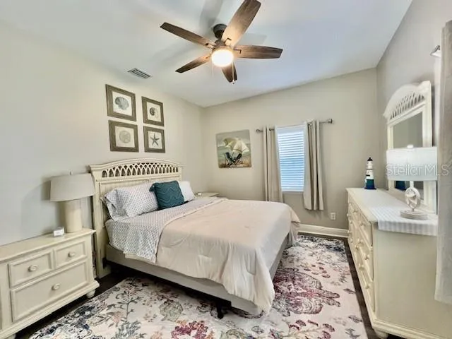 a view of a balcony with wooden floor and door