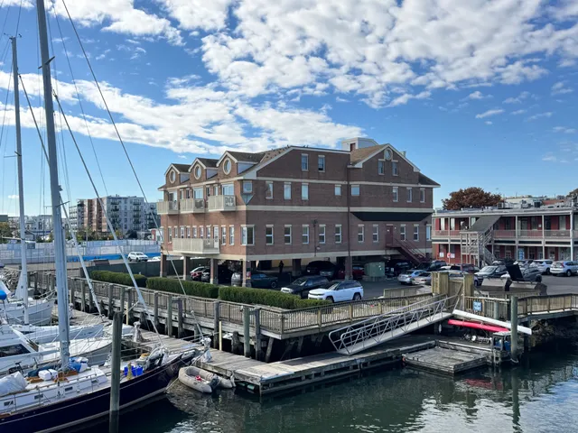 a view of a lake with building and city view