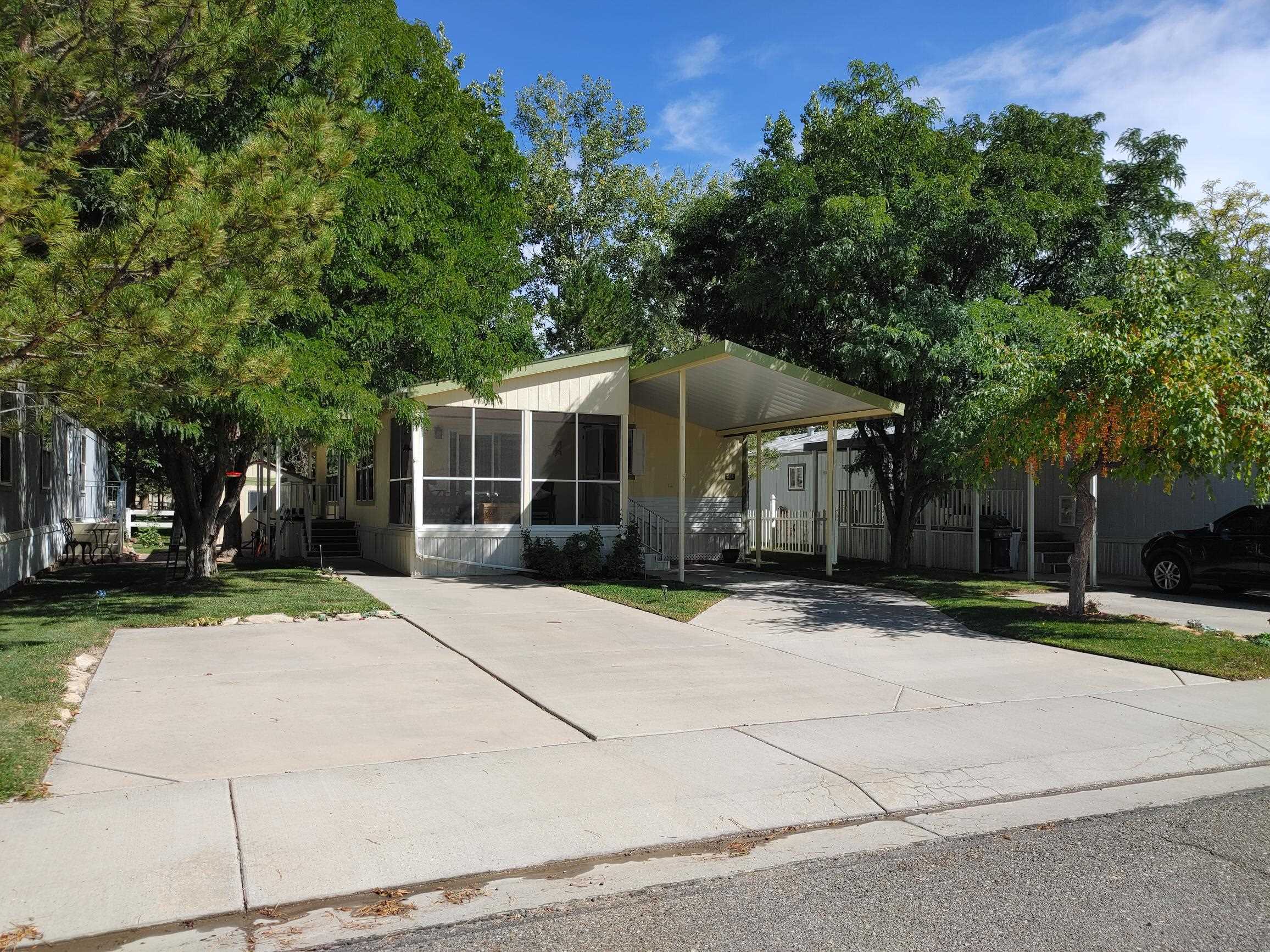 a house with trees in the background
