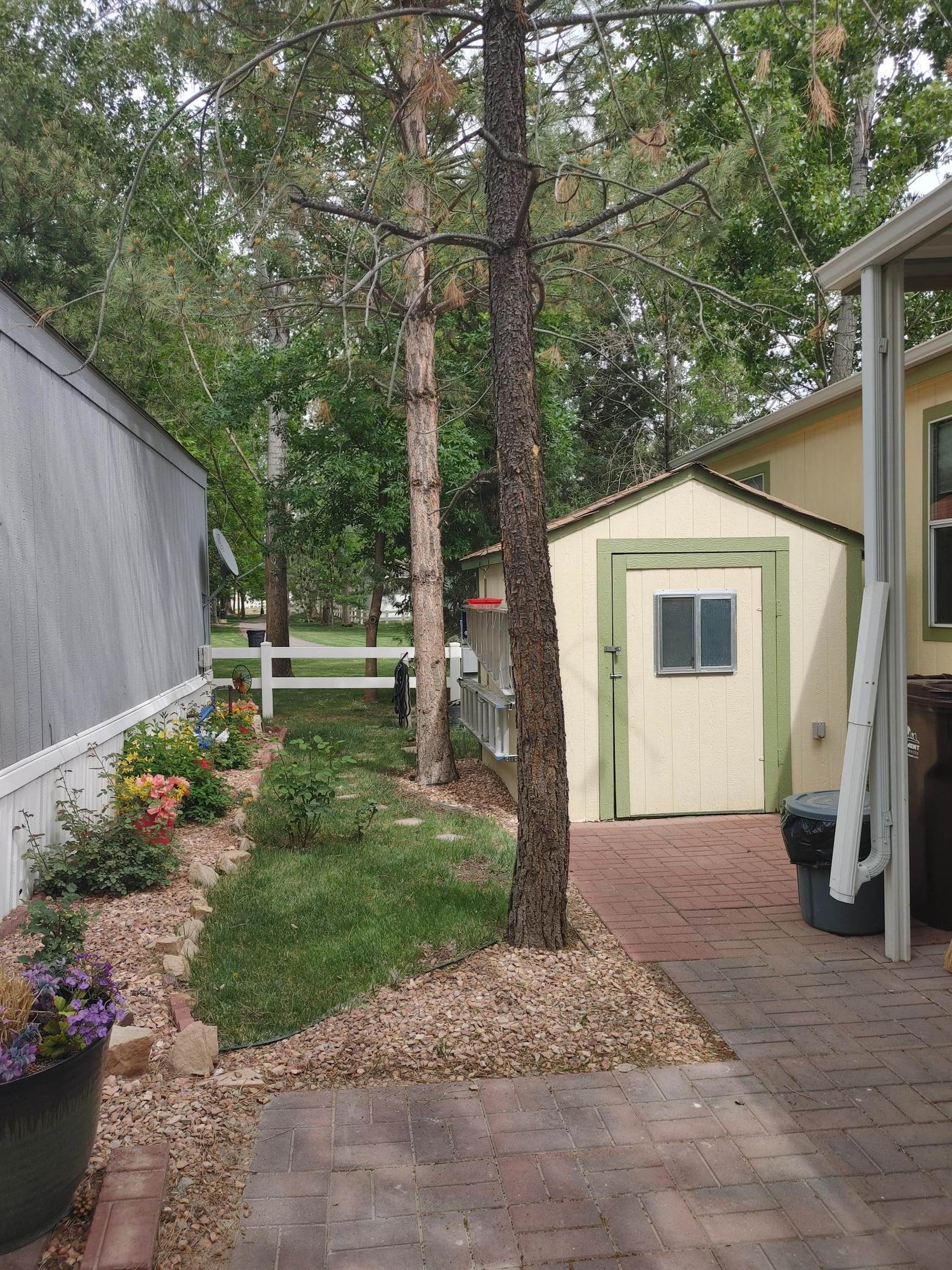 435 32 Road, Unit 252 Clifton, CO 81520 - Photo 18 of 27 a front view of a house with garden