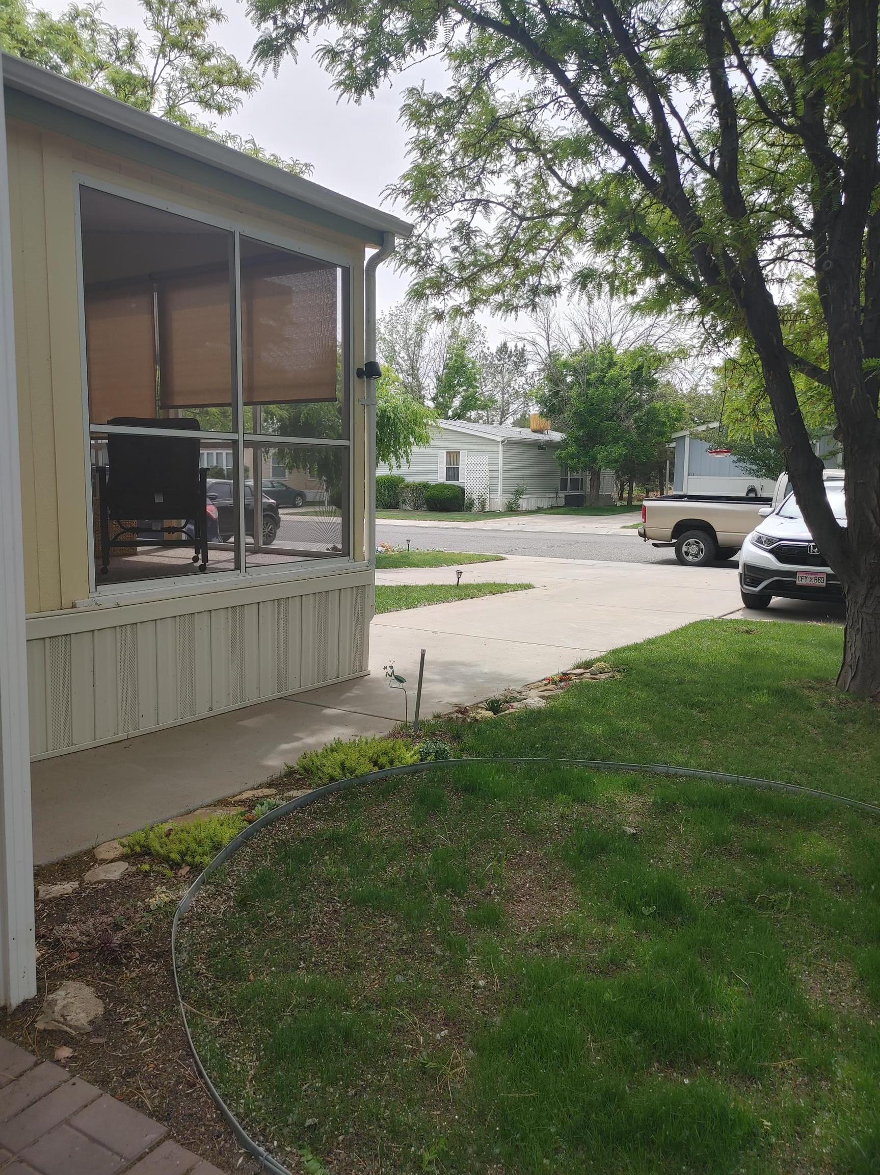 435 32 Road, Unit 252 Clifton, CO 81520 - Photo 19 of 27 a house view with a garden space