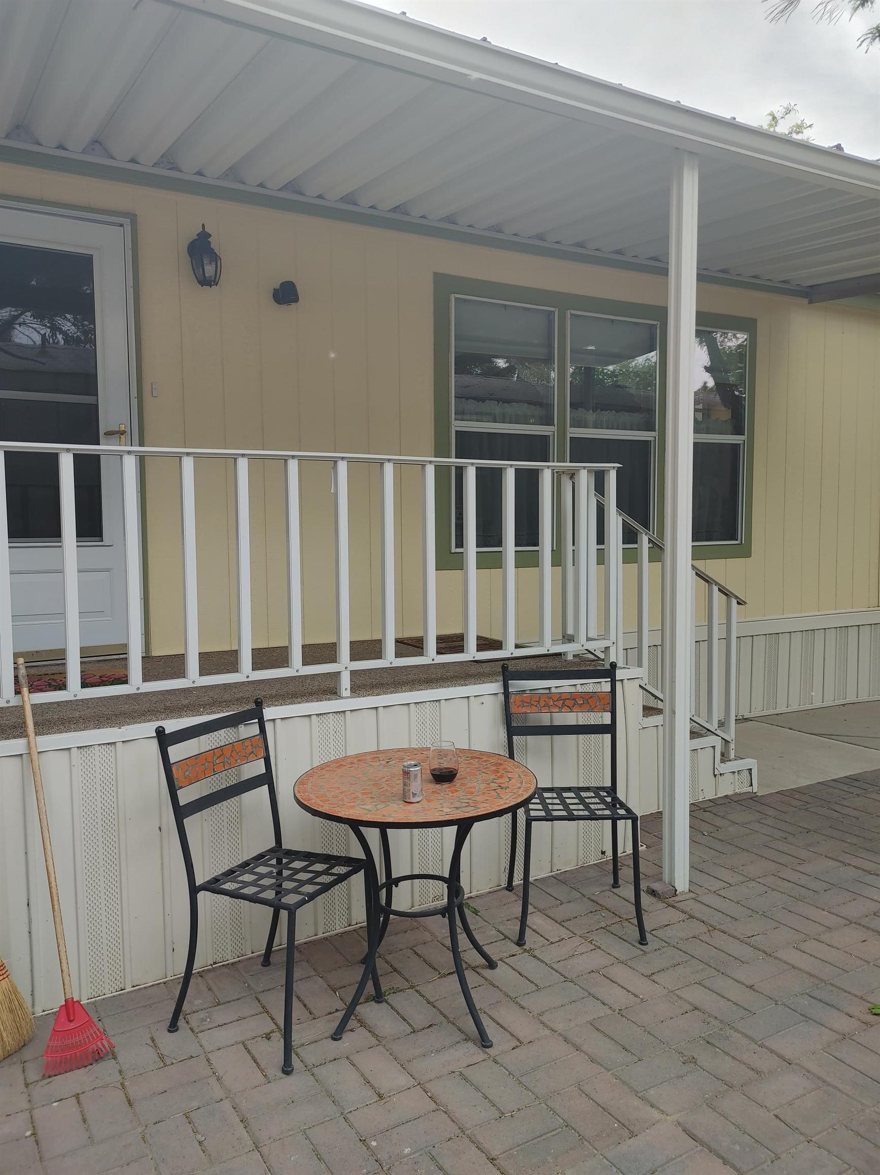 435 32 Road, Unit 252 Clifton, CO 81520 - Photo 6 of 27 a view of a wooden chairs and table in the patio