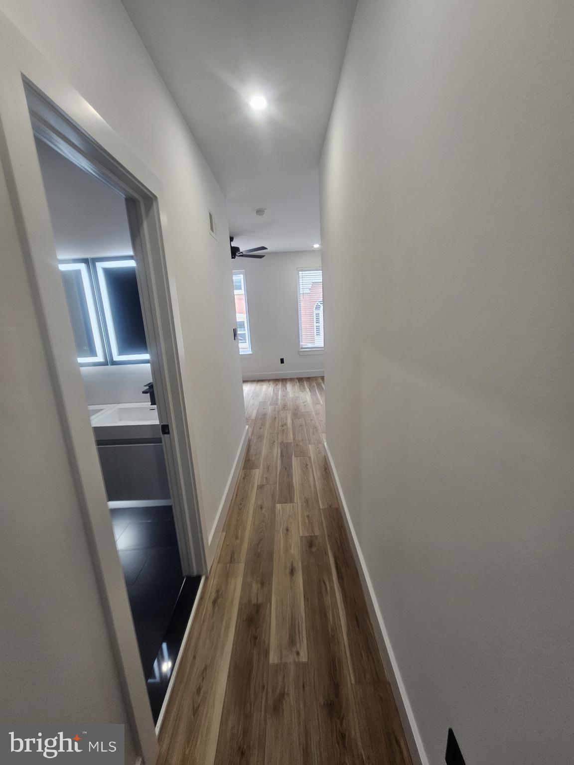 1250 North 18th Street, Unit 1 Philadelphia, PA 19121 - Photo 12 of 26 a view of a hallway view with wooden floor