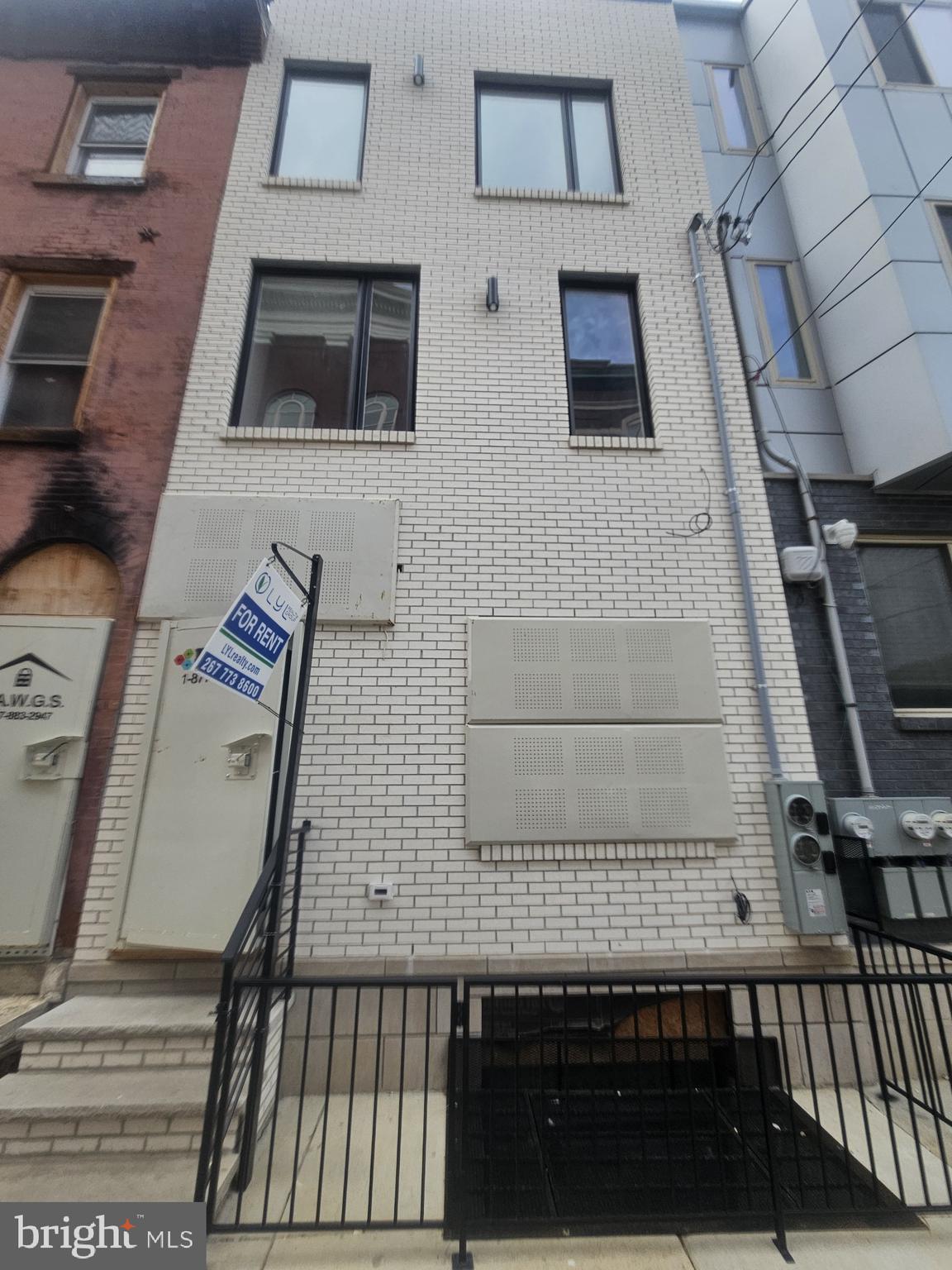 1250 North 18th Street, Unit 1 Philadelphia, PA 19121 - Photo 26 of 26 a view of a brick house with entryway