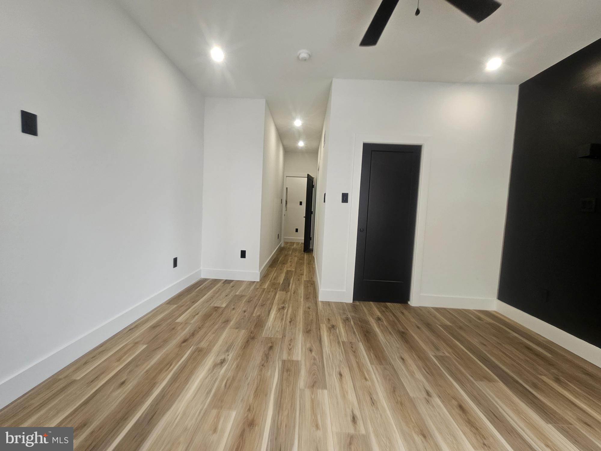 1250 North 18th Street, Unit 1 Philadelphia, PA 19121 - Photo 8 of 26 a view of a livingroom with a flat screen tv