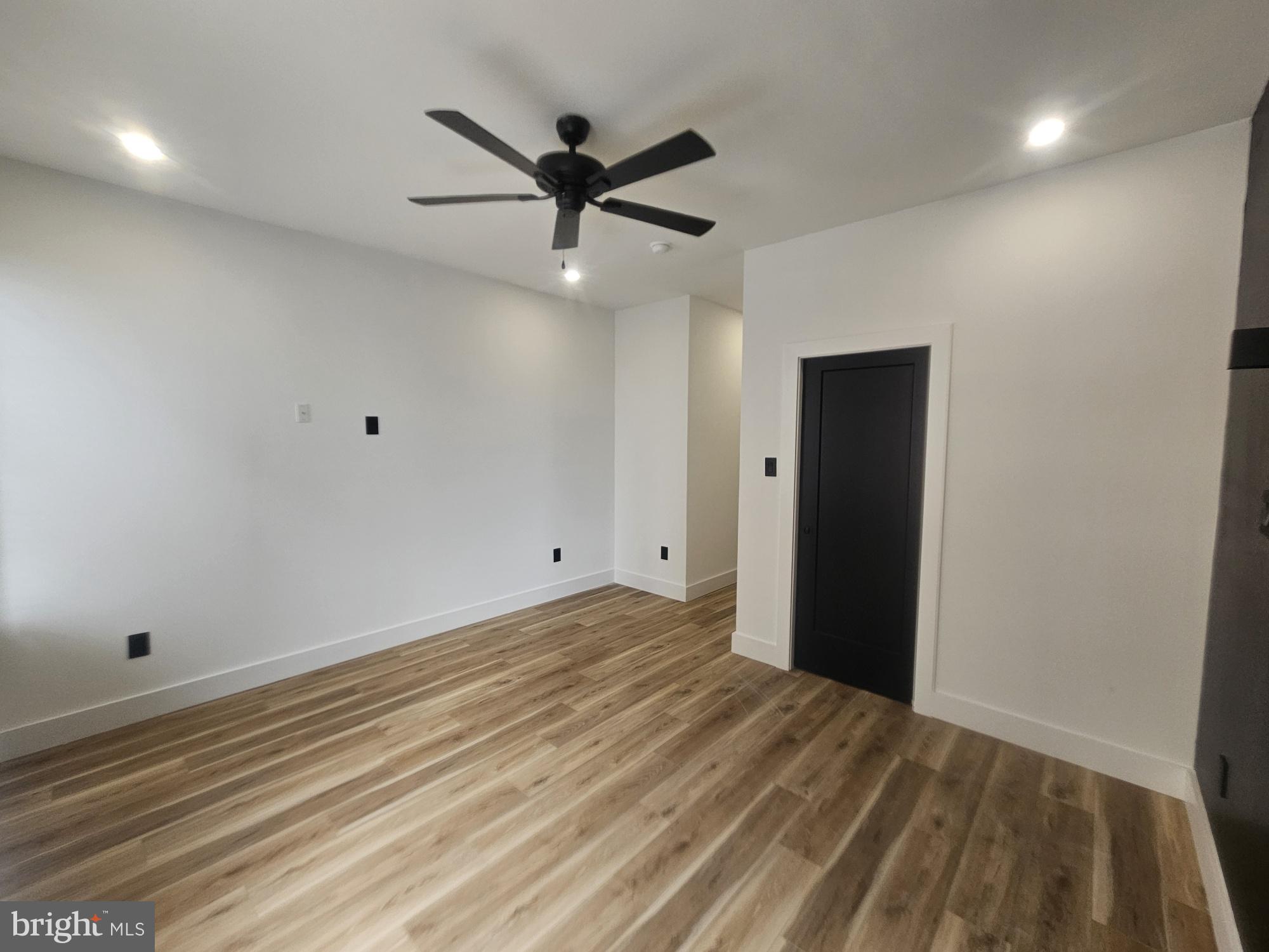 1250 North 18th Street, Unit 1 Philadelphia, PA 19121 - Photo 9 of 26 a view of a livingroom with a hardwood floor