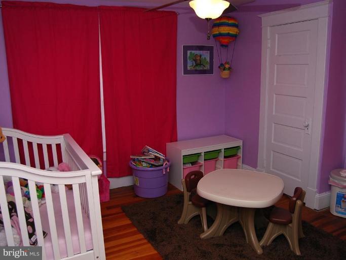 26621 Ridge Road Damascus, MD 20872 - Photo 7 of 18 a view of a balcony with chairs