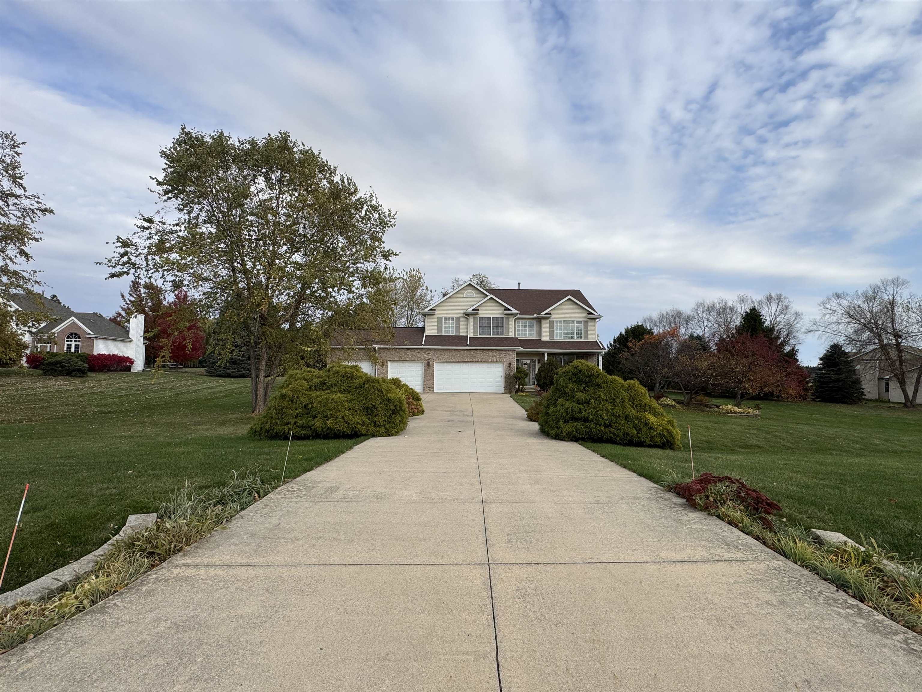 10133 Springborough Drive Rockford, IL 61107 - Photo 3 of 4 a view of house with outdoor space and garden