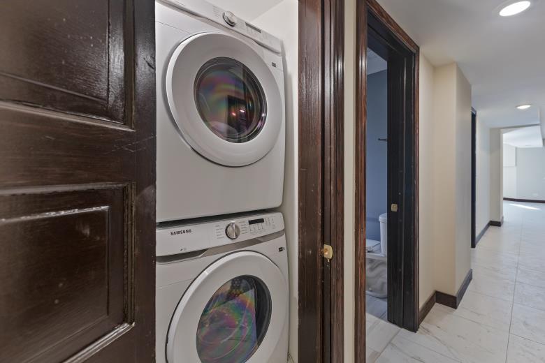 442 East 48th Street, Unit B1 Chicago, IL 60615 - Photo 20 of 21 a view of a hallway with washer and dryer