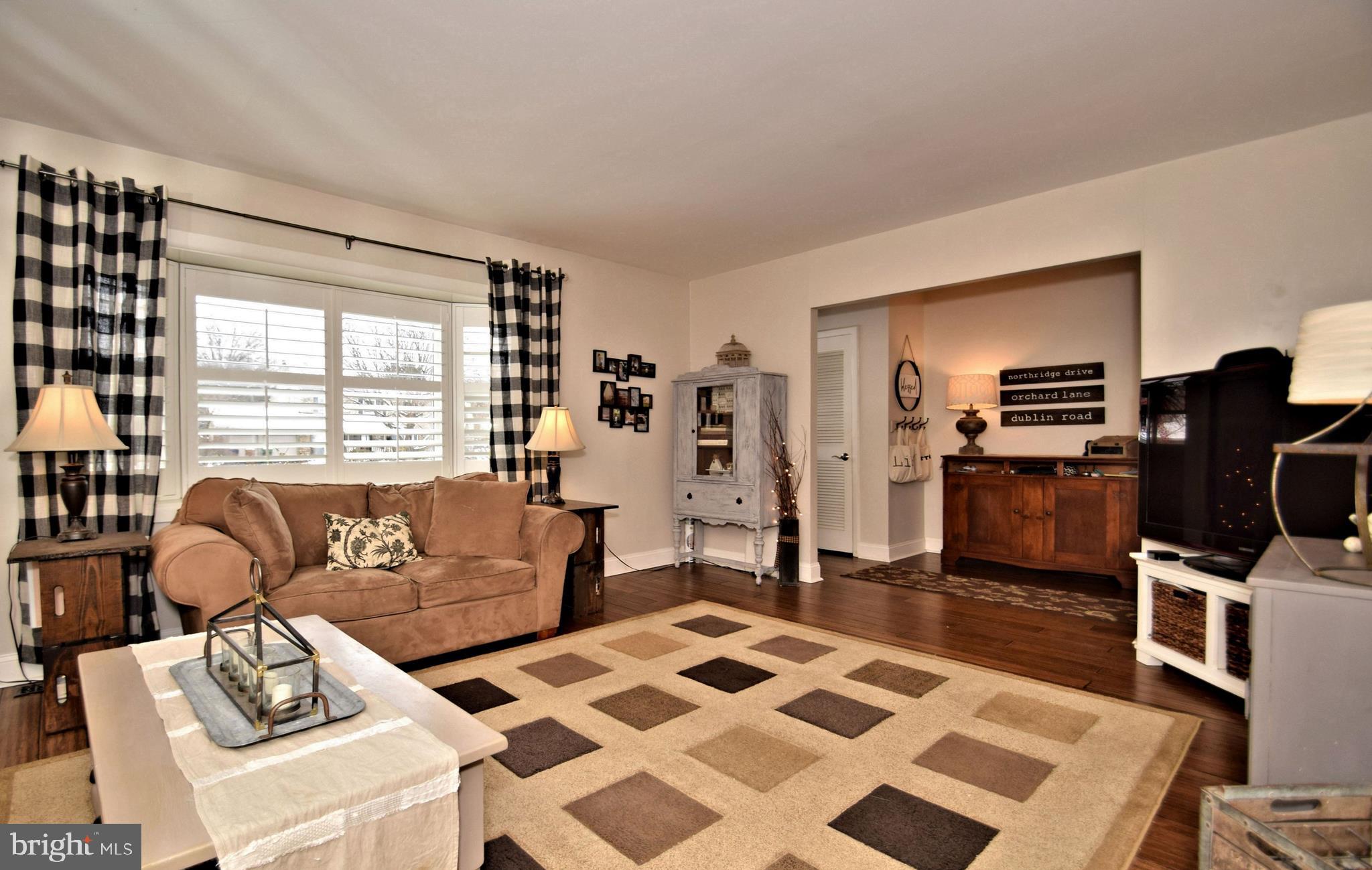 1641 Dublin Road Dresher, PA 19025 - Photo 6 of 24 Living Room with custom plantation shutters