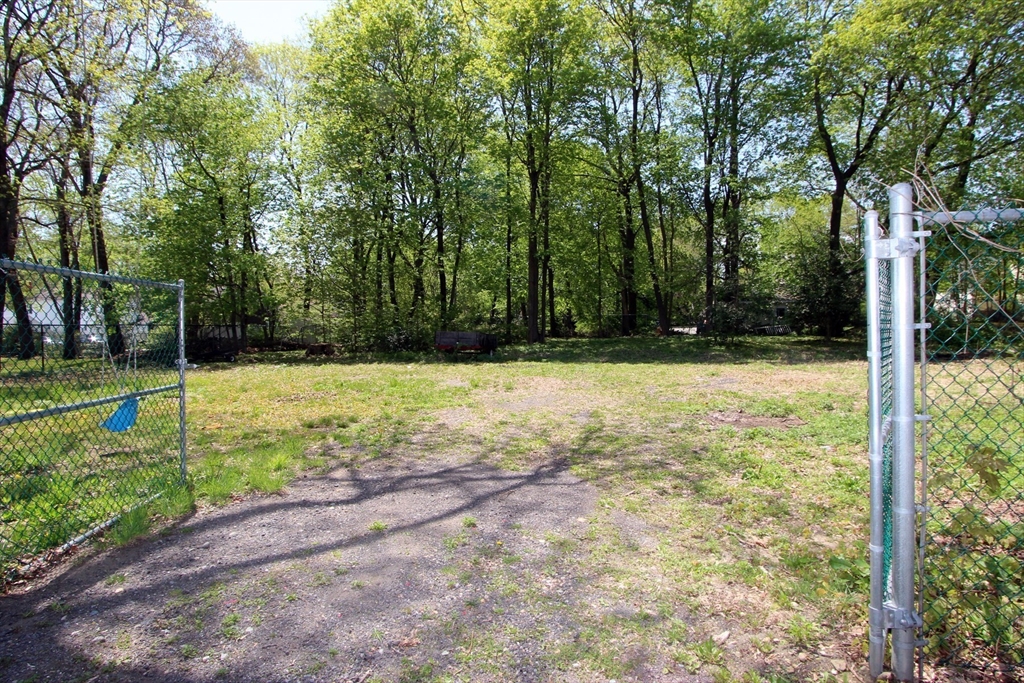 2 High Street Middleboro, MA 02346 - Photo 36 of 41 a view of a field with trees in the background