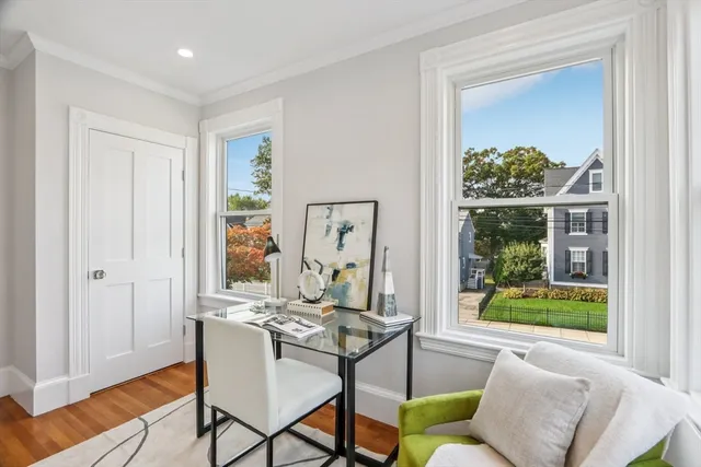 a view of a livingroom with furniture and window