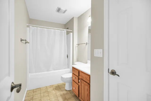 a view of storage and utility room with washer and dryer