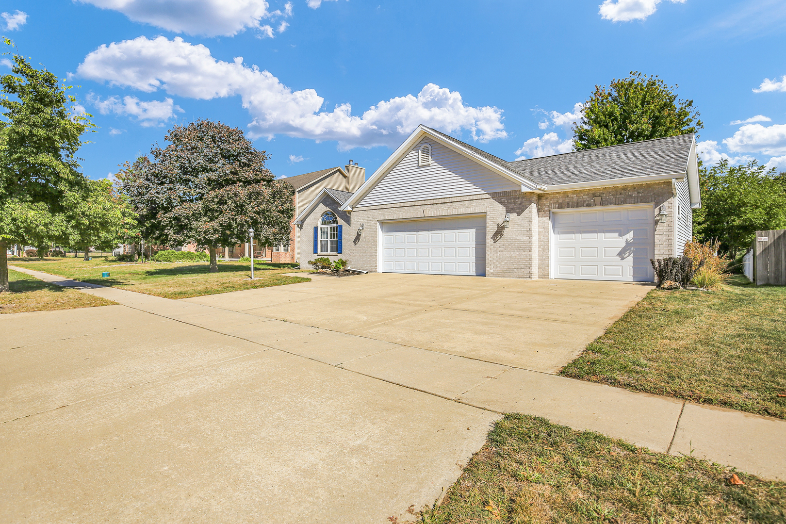 2004 Emerald Drive Champaign, IL 61822 - Photo 2 of 30 a view of an house with backyard and bushes