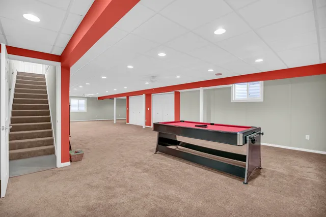 a large room with pool table