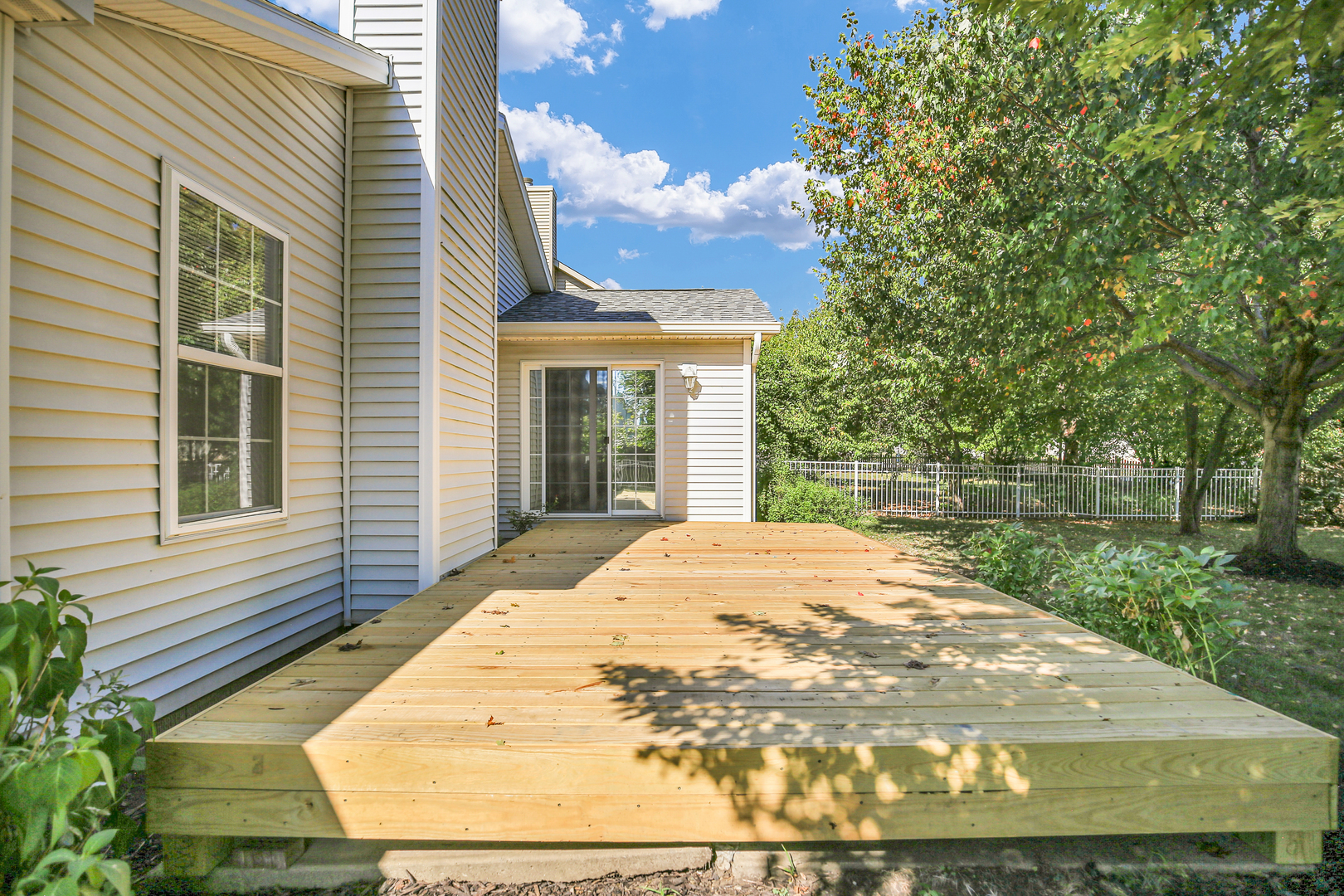 2004 Emerald Drive Champaign, IL 61822 - Photo 28 of 30 a view of house with yard outdoor seating and green space