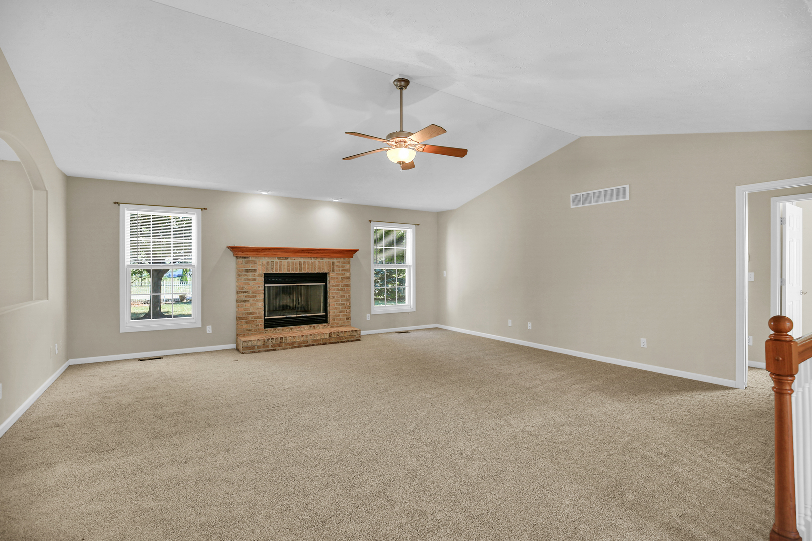 2004 Emerald Drive Champaign, IL 61822 - Photo 7 of 30 a view of an empty room with window and fireplace