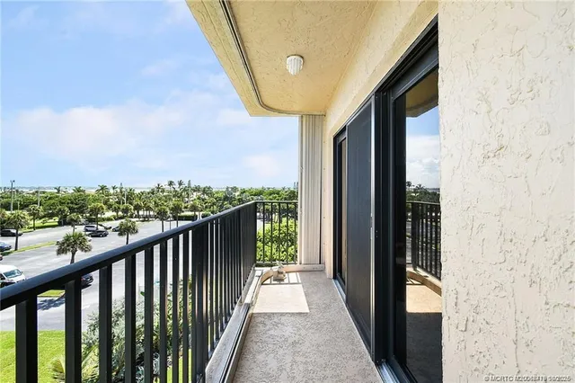 a view of a balcony with an ocean view