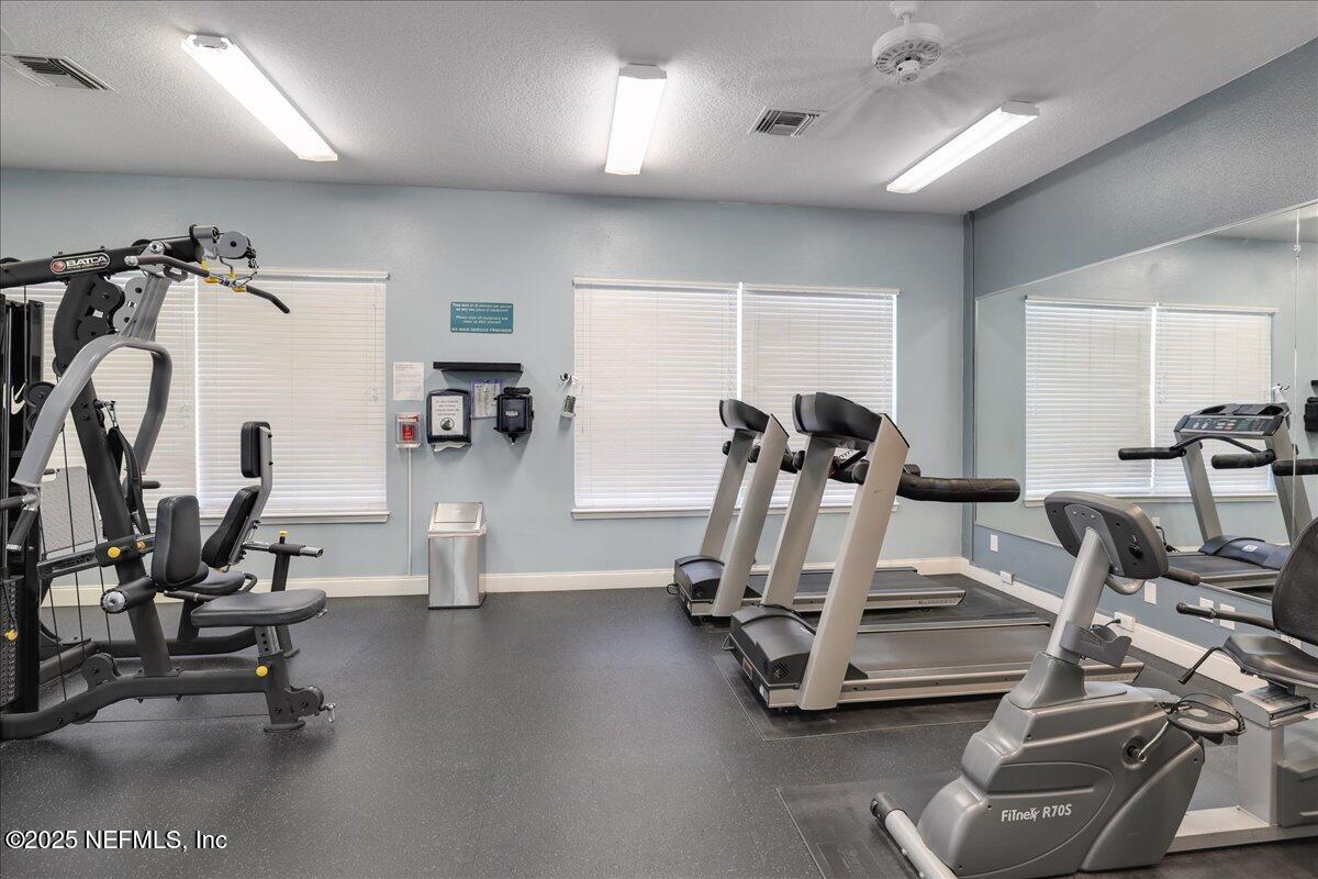 10550 Baymeadows Road, Unit 807 Jacksonville, FL 32256 - Photo 16 of 22 a view of a room with gym equipment