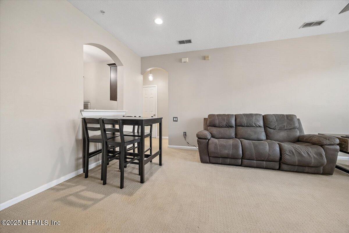 10550 Baymeadows Road, Unit 807 Jacksonville, FL 32256 - Photo 5 of 22 a living room with furniture