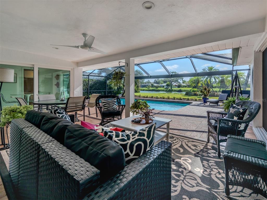 1228 Pine Needle Road Venice, FL 34285 - Photo 15 of 84 Covered Lanai off Living Room