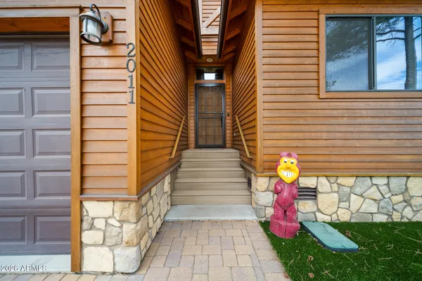 a view of a pathway of back yard