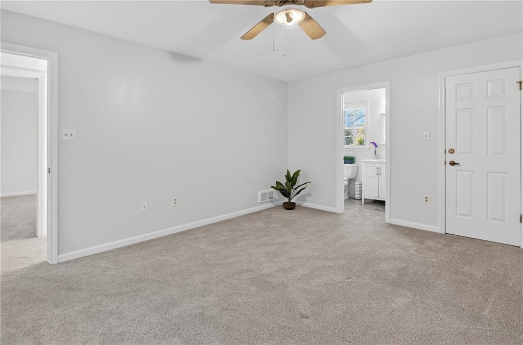 142 Roscommon Place Canonsburg, PA 15317 - Photo 18 of 31 an empty room with a chandelier fan and glass door