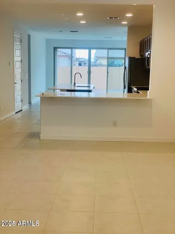 a living room with a flat screen tv