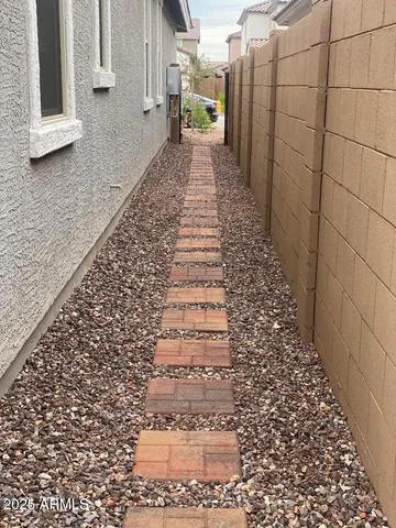 a view of a pathway door and an empty room