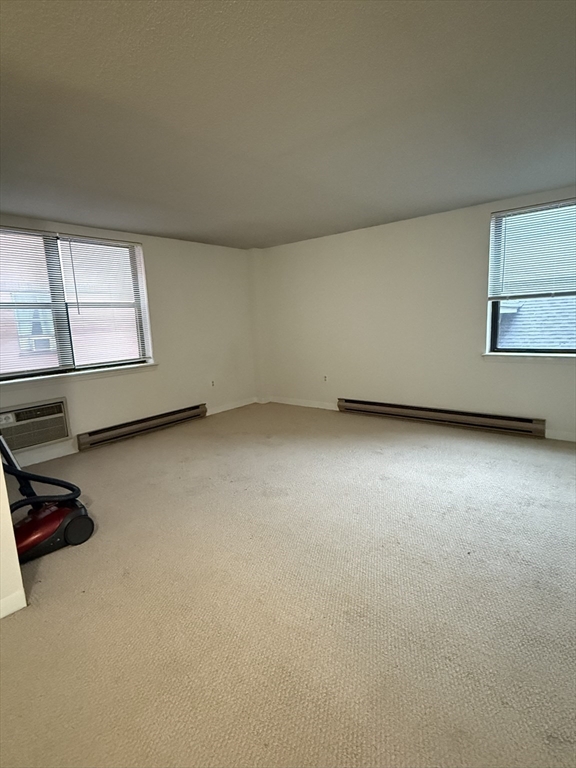 5 Bank, Unit 4A Attleboro, MA 02703 - Photo 4 of 9 an empty room with windows