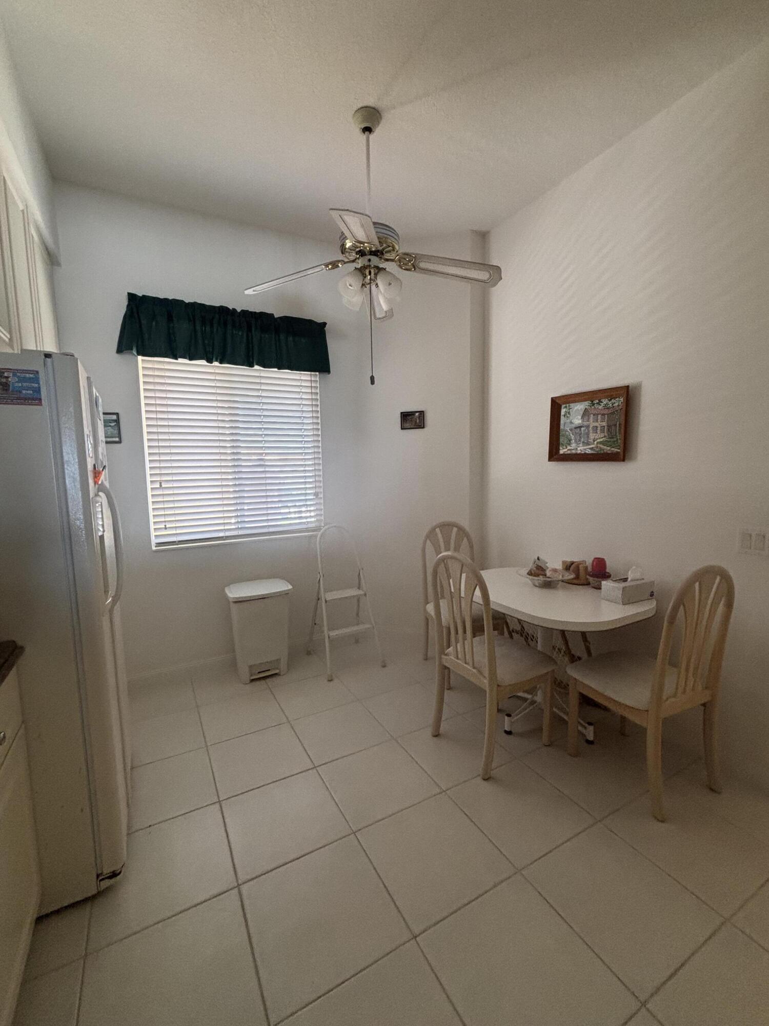 15 Harbour Isle Drive West, Unit PH 5 Fort Pierce, FL 34949 - Photo 4 of 20 a view of a livingroom with furniture and a window