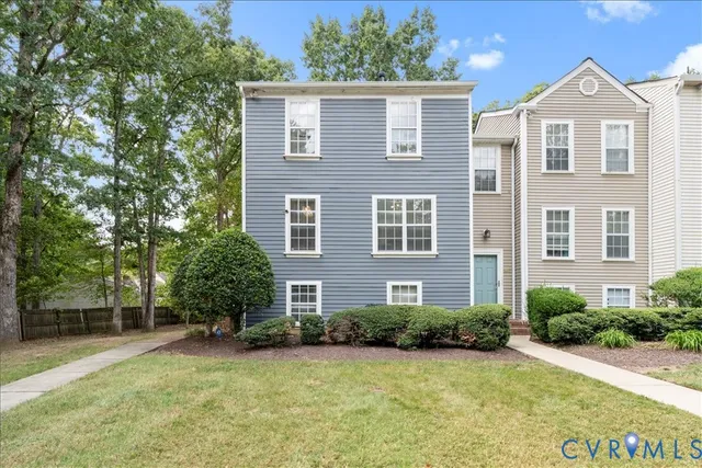 front view of a house with a yard