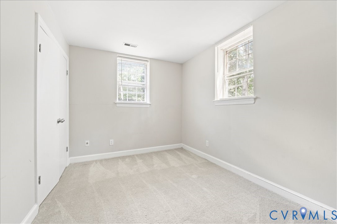 11601 Timberly Waye Henrico, VA 23238 - Photo 24 of 39 an empty room with windows