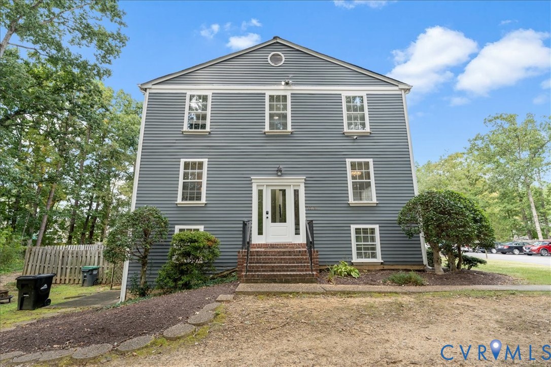 11601 Timberly Waye Henrico, VA 23238 - Photo 3 of 39 a front view of a house with a yard