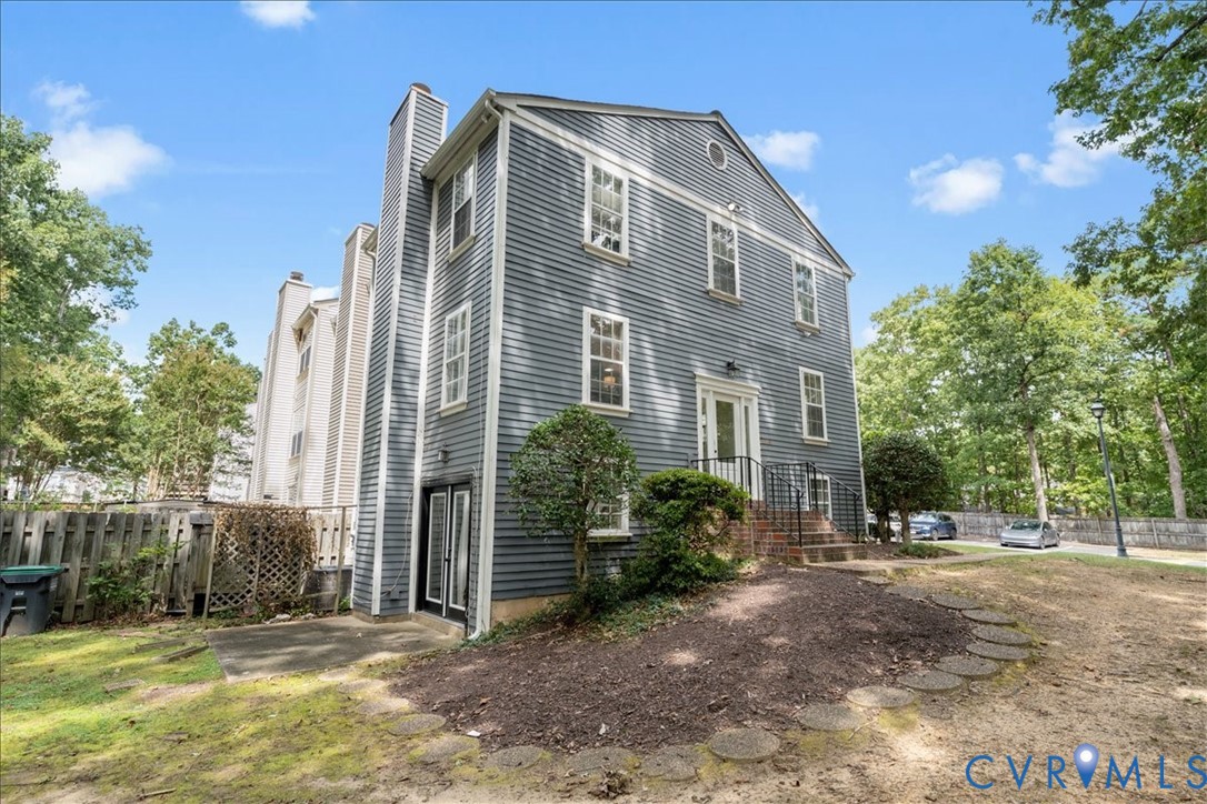 11601 Timberly Waye Henrico, VA 23238 - Photo 35 of 39 a front view of a house with a yard