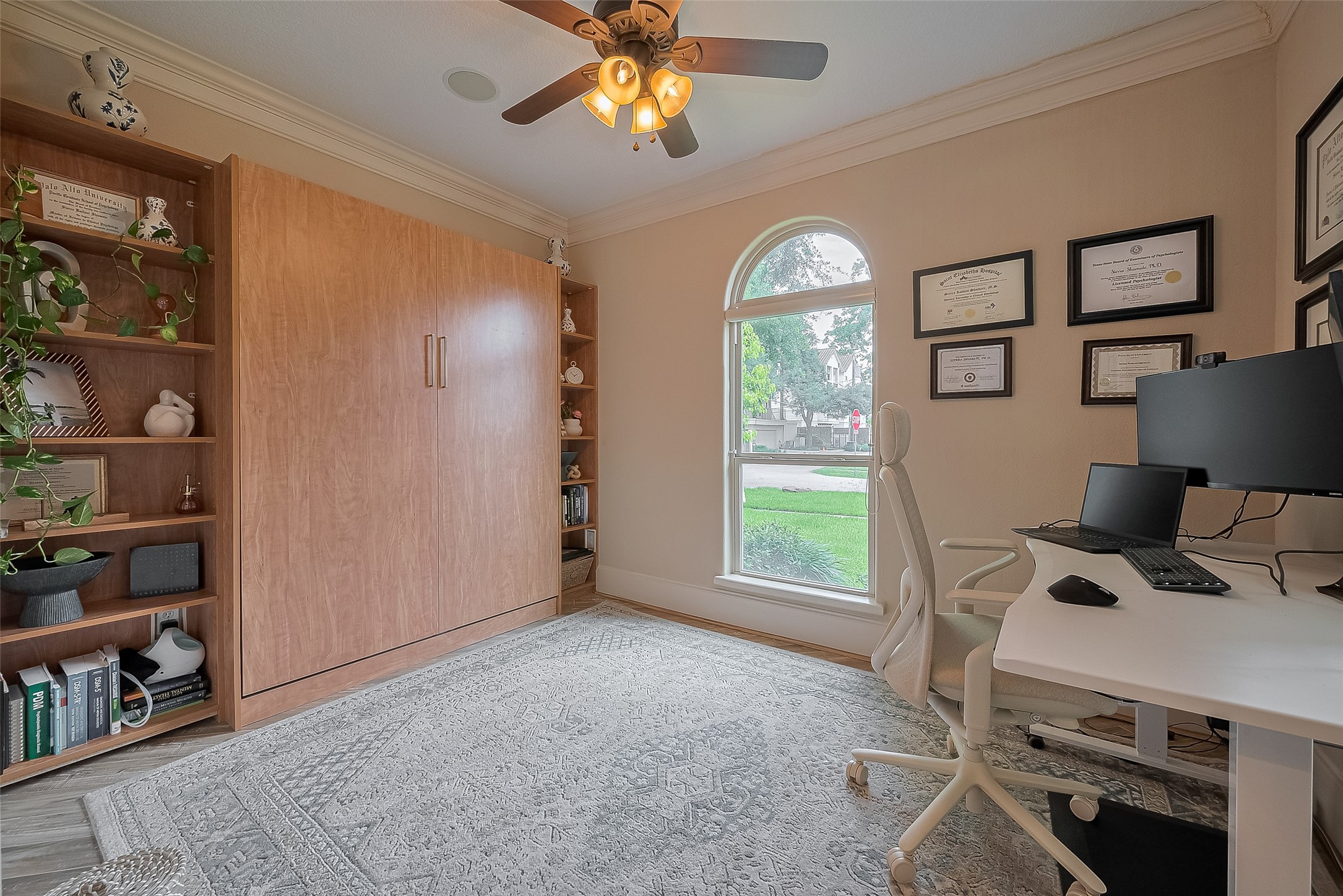 6419 Rodrigo Street Houston, TX 77007 - Photo 6 of 35 The first floor bedroom provides a spacious room that can double as an office. Equipped with a built in Murphy Bed and pouring natural light!