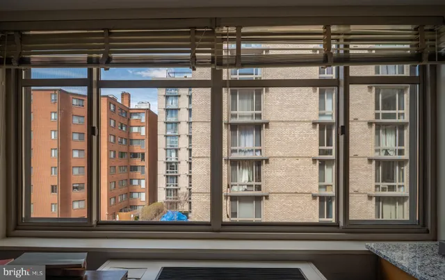 a view of a living room and entry way