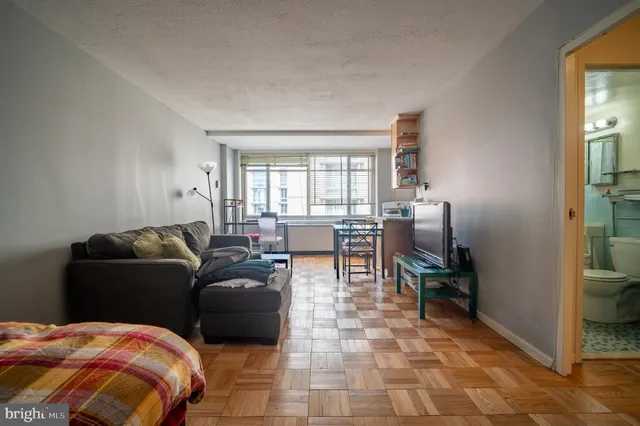 a living room with furniture and a couch