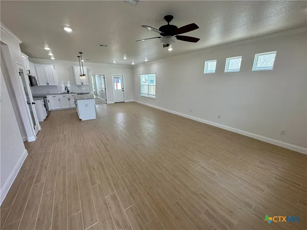 a view of kitchen and windows
