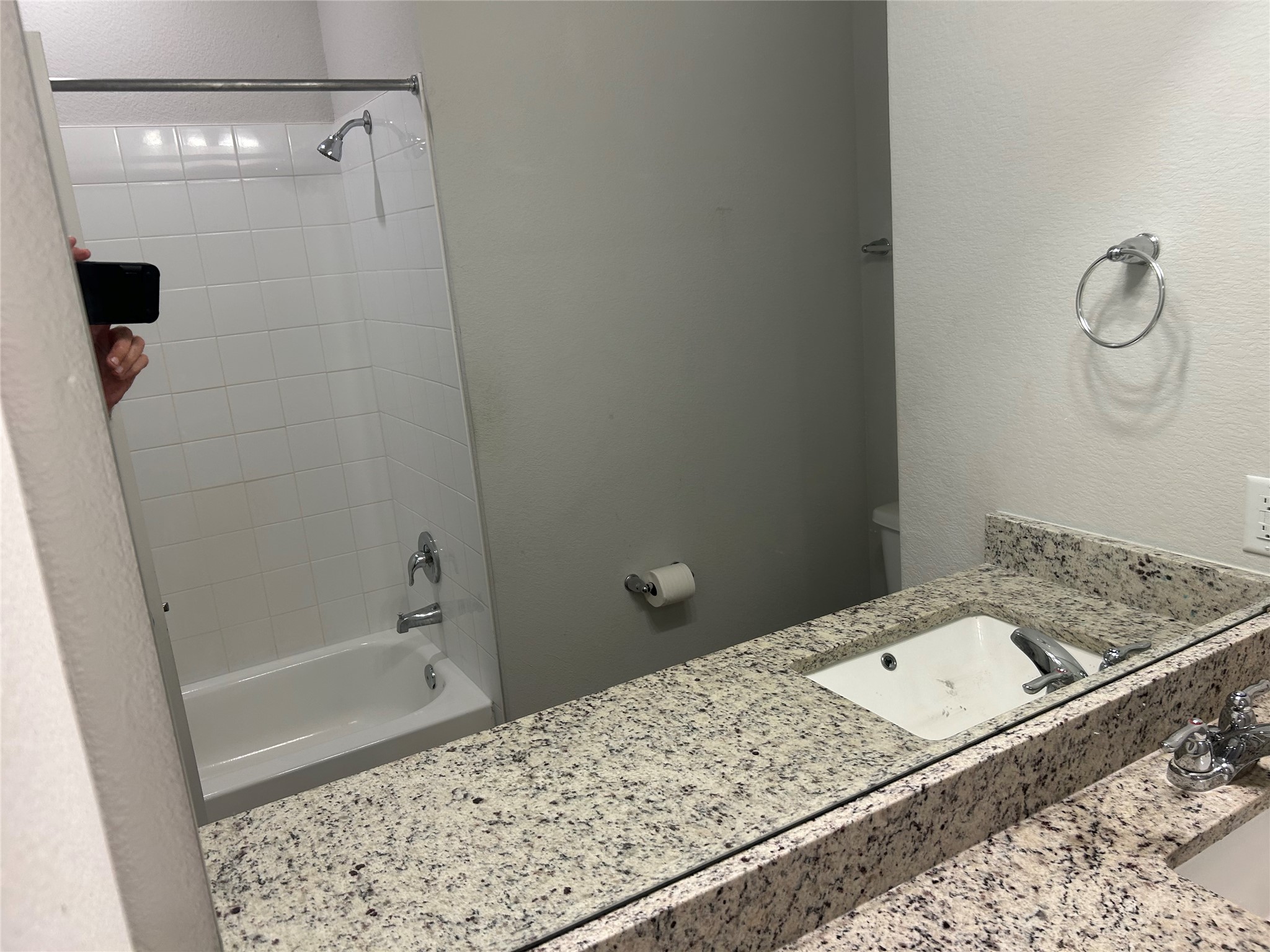 118 Two Bits Lane Elgin, TX 78621 - Photo 14 of 23 Polished granite countertops bring enduring character to this clean, functional bathroom space.