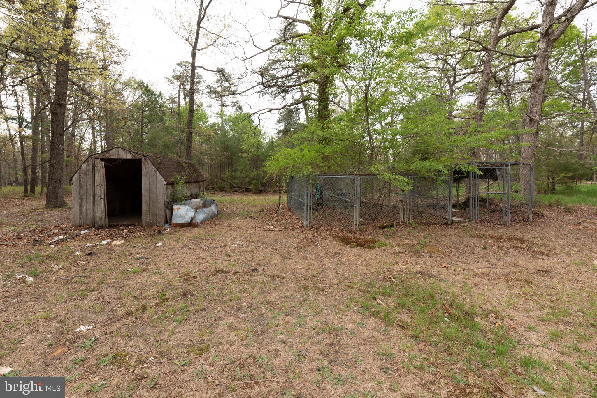 450 Weymouth Road Buena, NJ 08310 - Photo 18 of 48 a view of a barn with green space and wooden fence