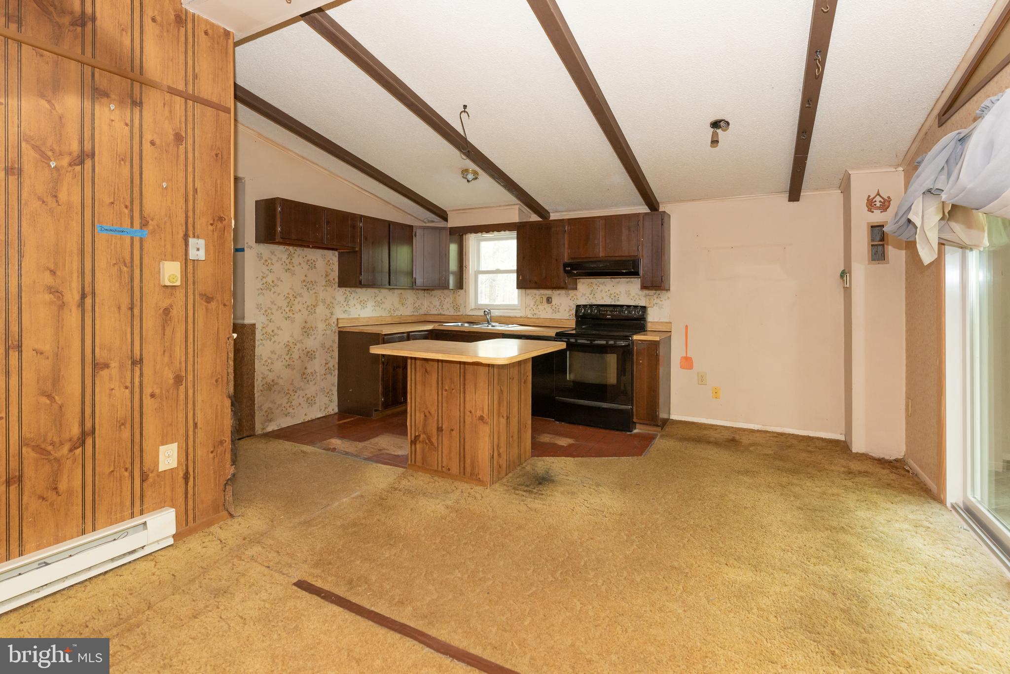 450 Weymouth Road Buena, NJ 08310 - Photo 30 of 48 a kitchen with stainless steel appliances granite countertop a sink stove and refrigerator